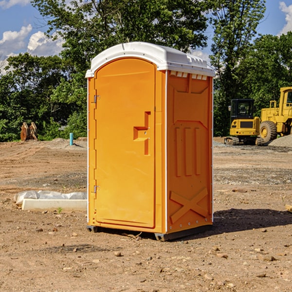 what is the cost difference between standard and deluxe portable toilet rentals in Mizpah